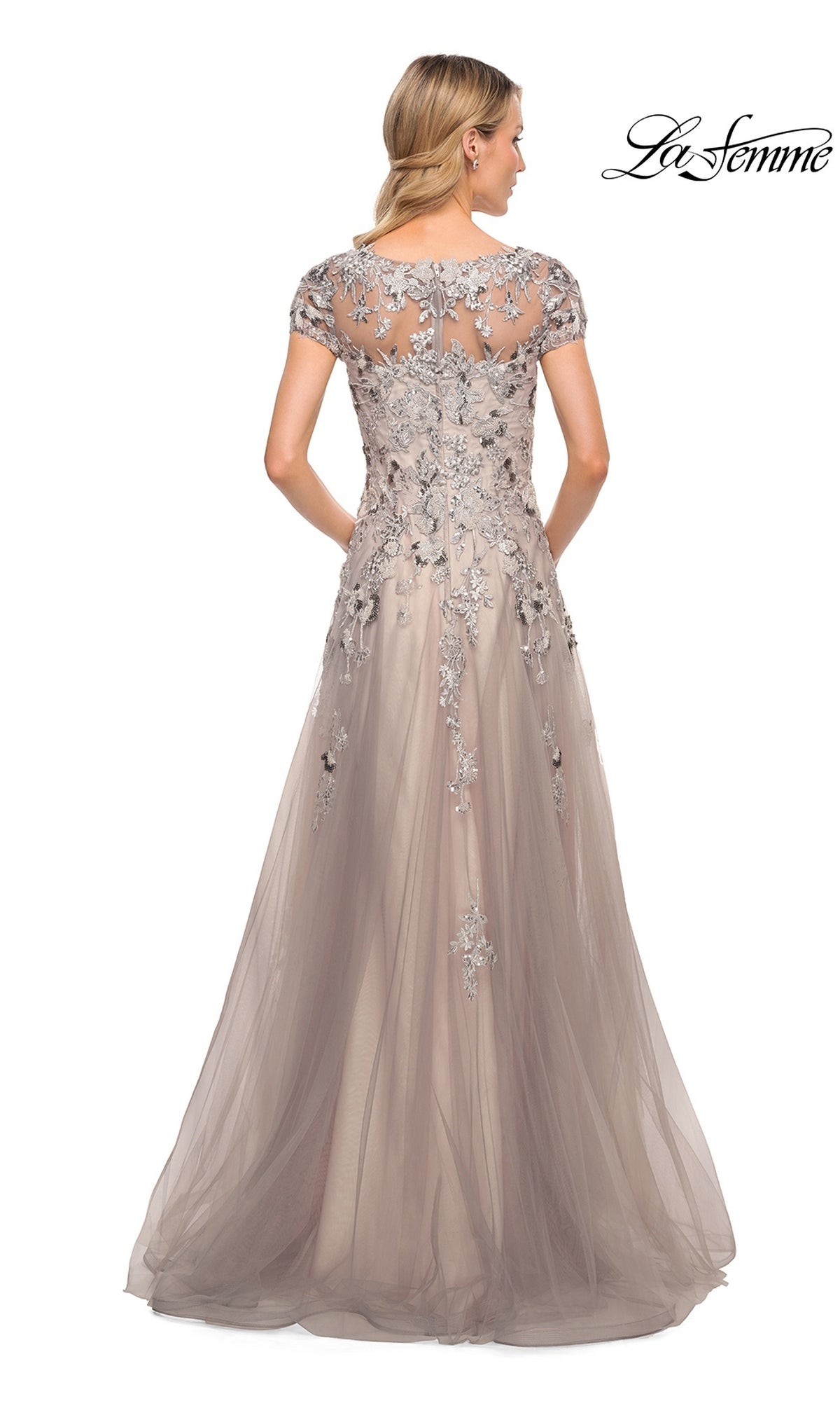 Back view of the Long Formal Dress: La Femme 30239, a floor-length, taupe modest formal gown with short sleeves and silver floral embroidery over tulle.